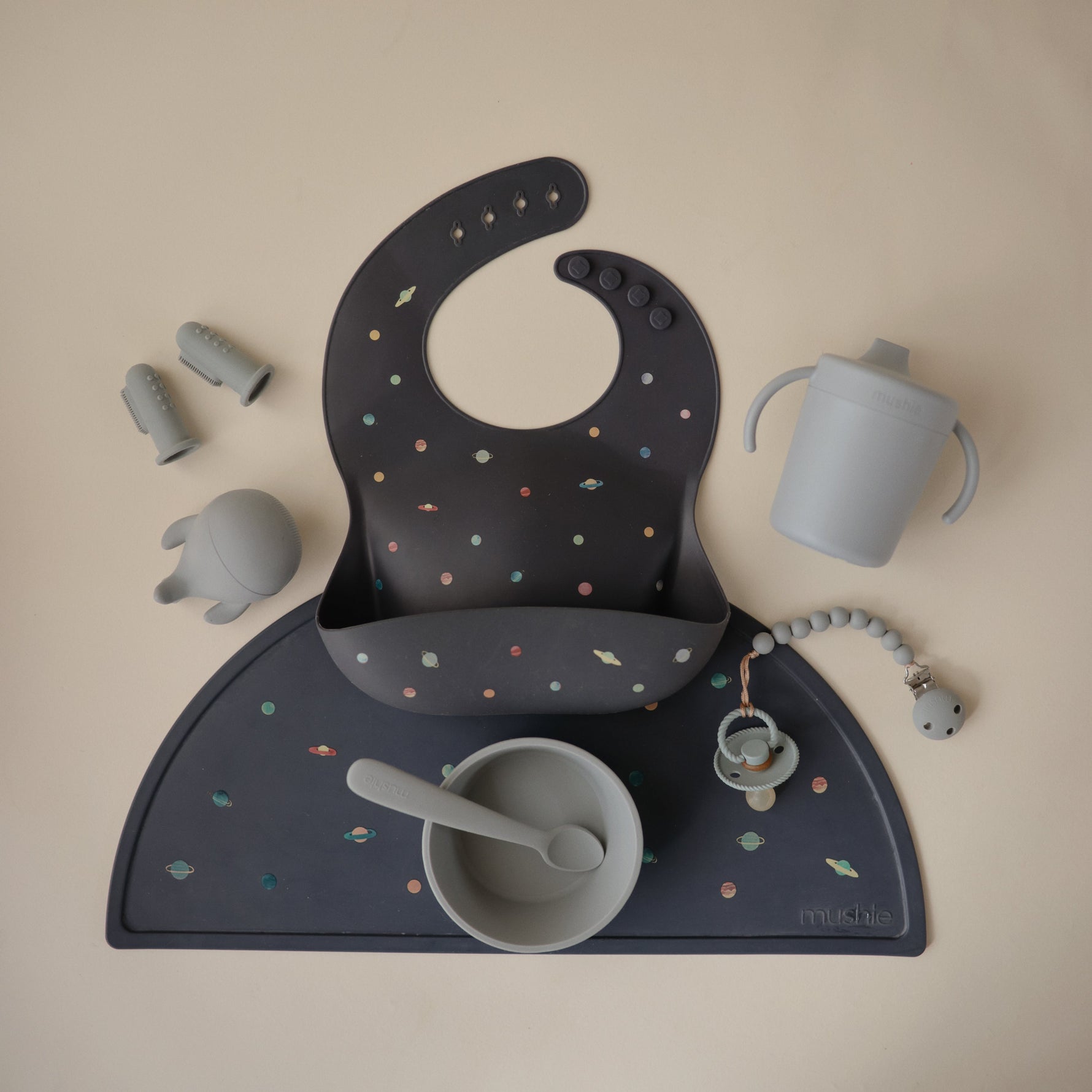 Mushie food-grade, non-slip silicone placemat for baby feeding.