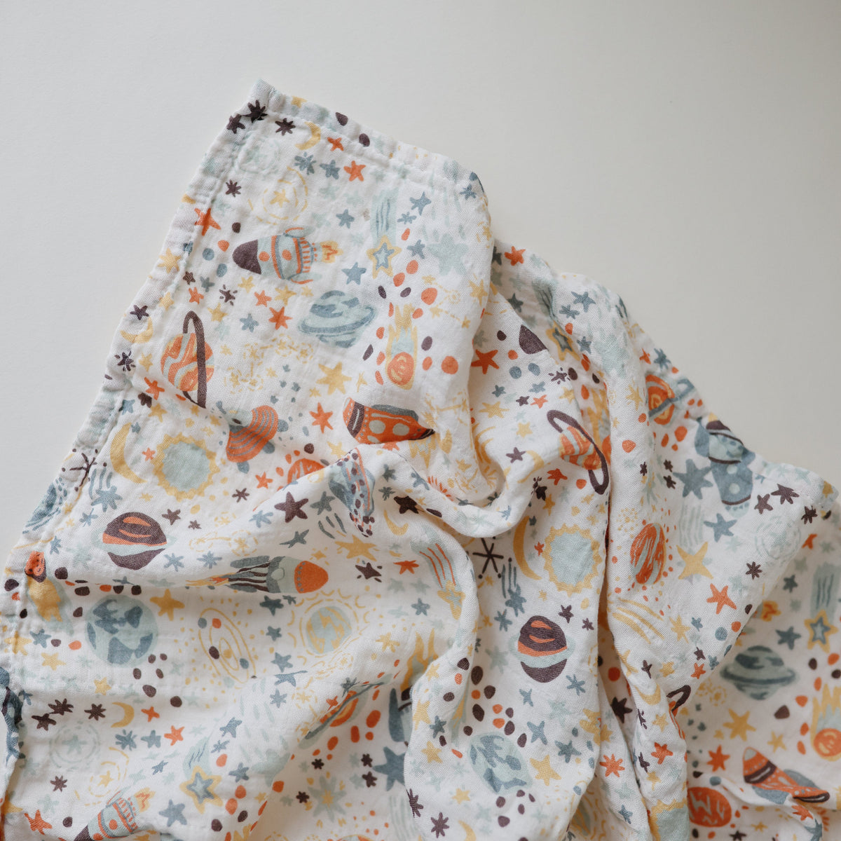 Mushie organic cotton muslin swaddle blanket, soft and breathable