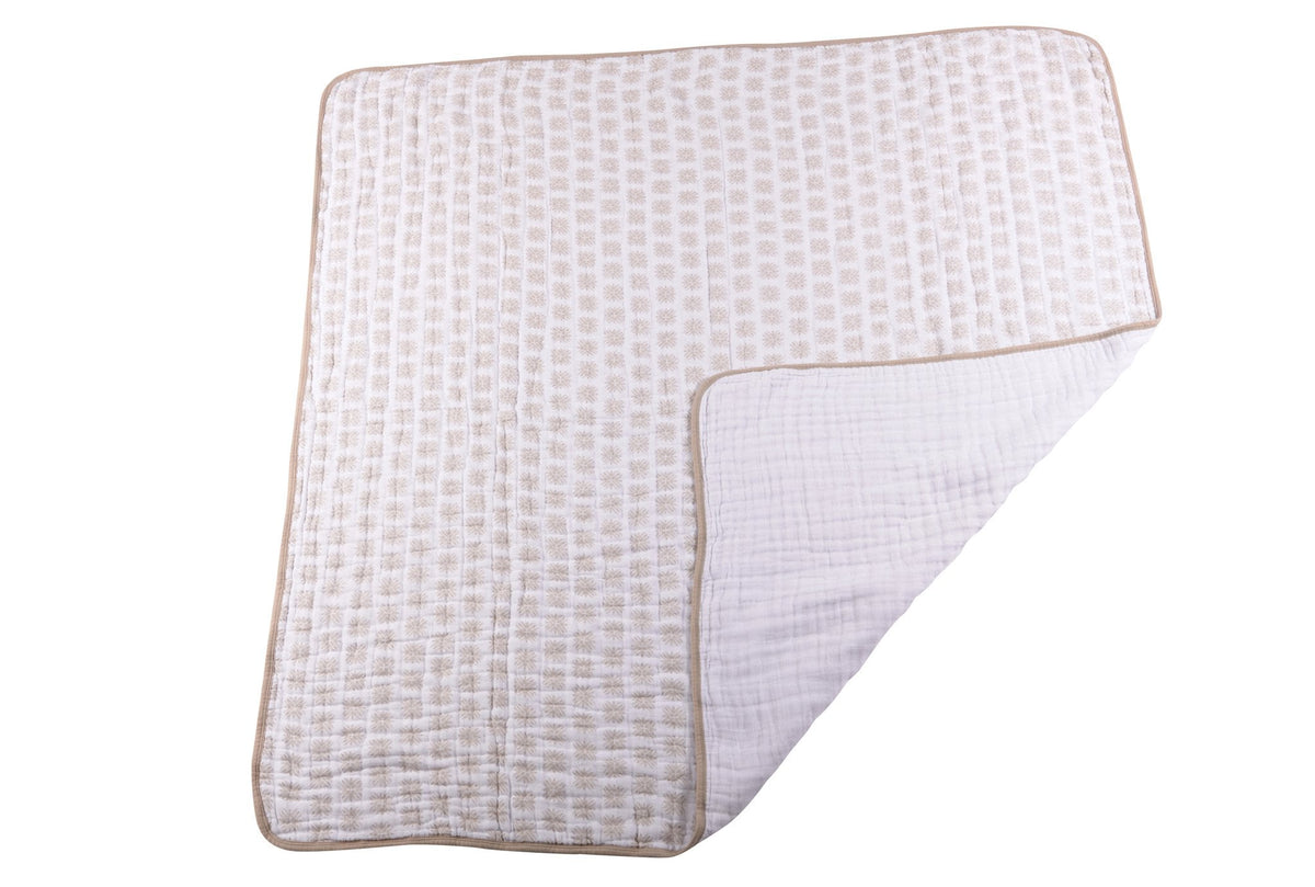 Soft organic cotton muslin baby blanket with a whimsical Flower Child floral print.