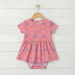 Short sleeve baby bodysuit dress in a flower confetti print with a full skirt and snaps at the bottom