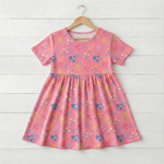 Short sleeve dress in a scattered flower confetti print on a light background
