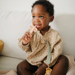 Mushie Flower Training Toothbrush for Kids - Soft Silicone Bristles for Gentle Cleaning and Gum Stimulation -