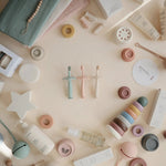 Mushie Flower Training Toothbrush for Kids - Soft Silicone Bristles for Gentle Cleaning and Gum Stimulation -