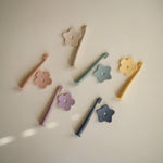 Mushie Flower Training Toothbrush for Kids - Soft Silicone Bristles for Gentle Cleaning and Gum Stimulation -