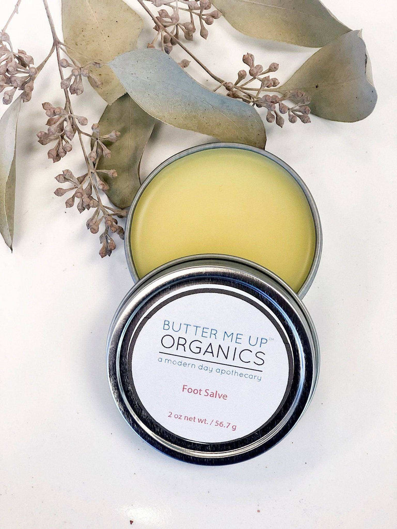 Hydrating foot salve in open tin, perfect for cracked heels.