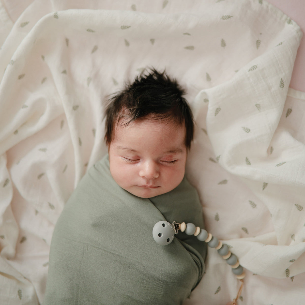 Mushie organic cotton muslin swaddle blanket