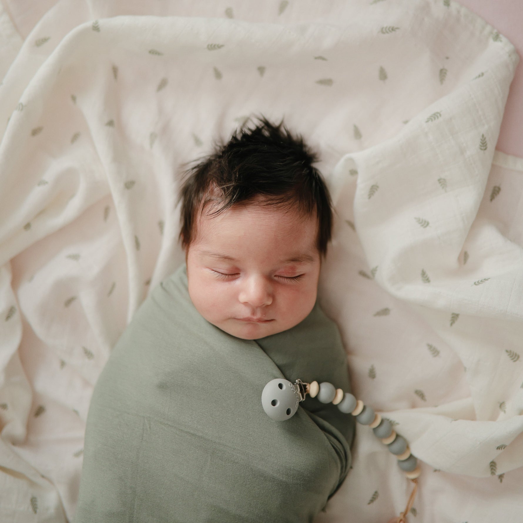 Mushie organic cotton muslin swaddle blanket