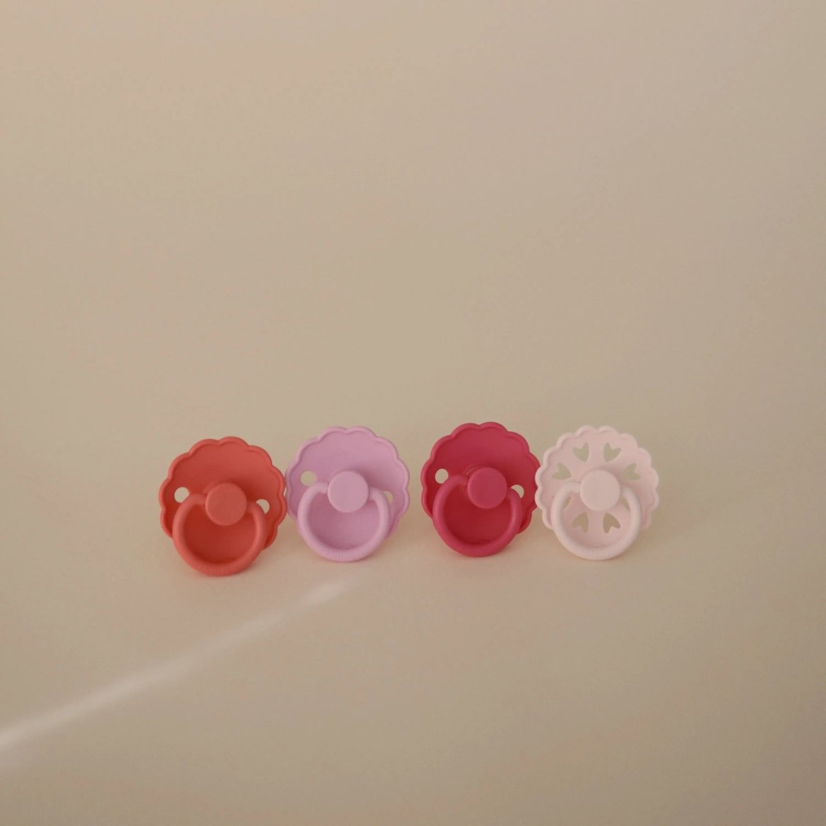 Mushie FRIGG Silicone Pacifier Four Pack for Baby Comfort with Safe Design and Soft Colors - 
