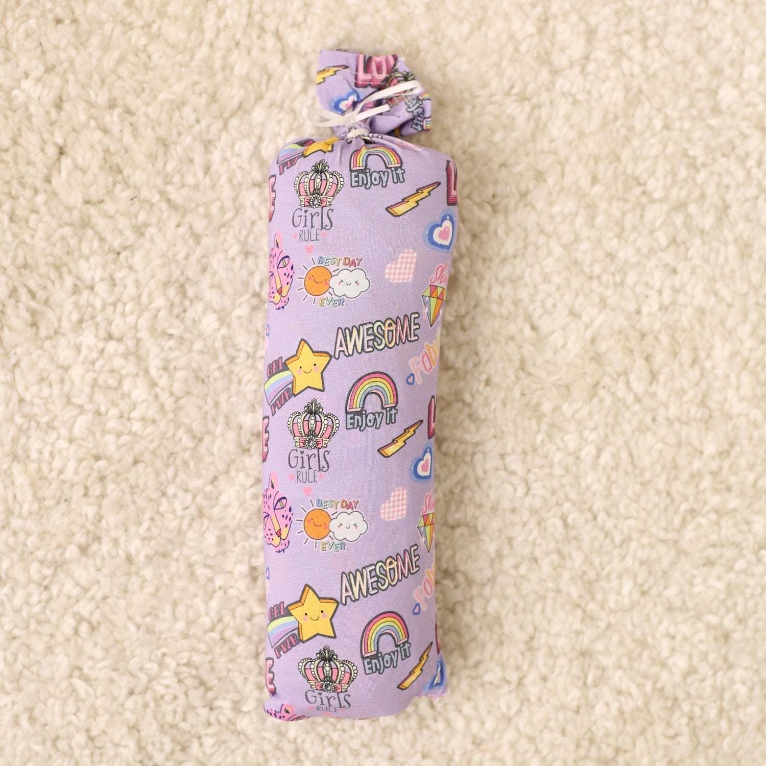Girl Power swaddle blanket with bright empowering print, spread flat and square