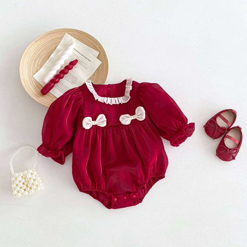 Girls long sleeves square ruffle neck top with bows in vibrant red color.