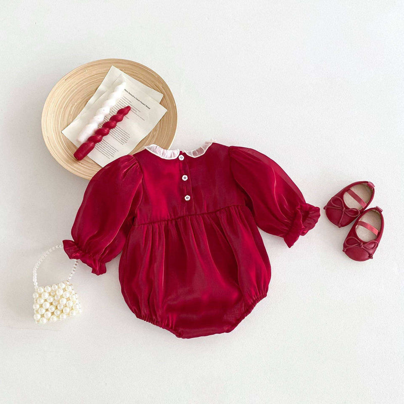 Girls long sleeves square ruffle neck dress in vibrant red with matching shoes and accessories.