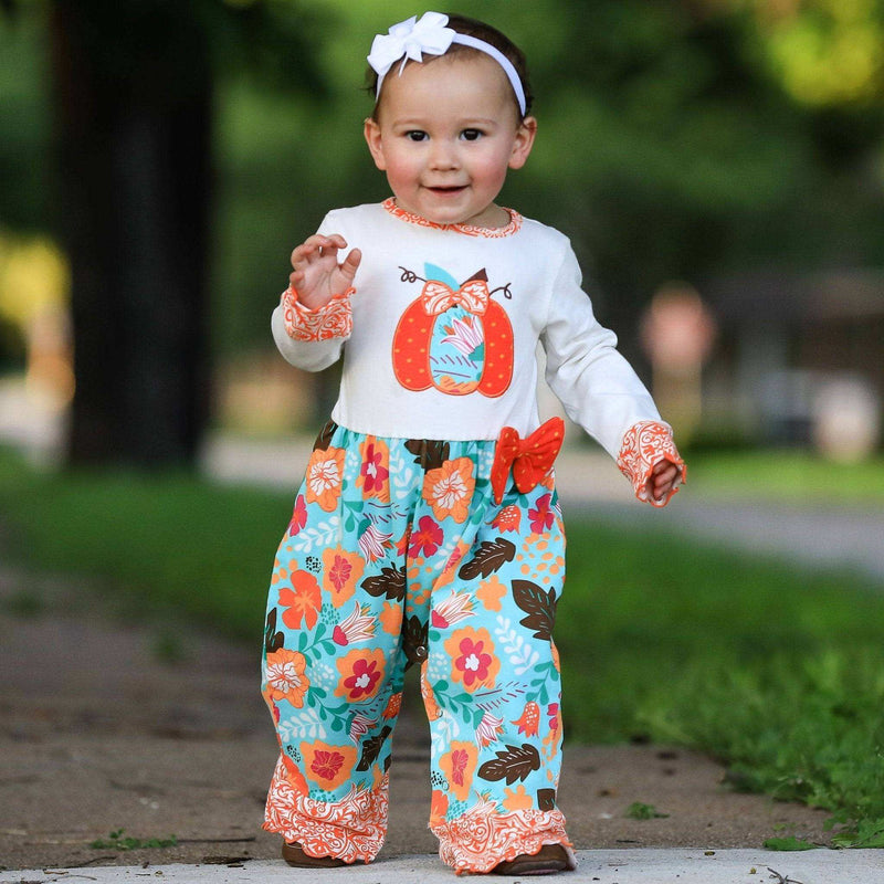 Girls Thanksgiving romper with orange pumpkin embroidery and floral damask prints.