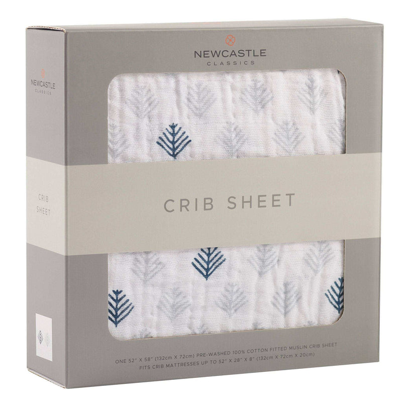 Glacier Branch Cotton Muslin Crib Sheet in packaging, breathable 100% cotton for year-round comfort.