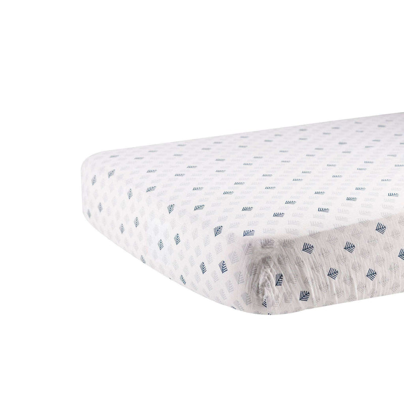 Glacier Branch crib sheet in breathable cotton muslin, fits standard crib mattress snugly.