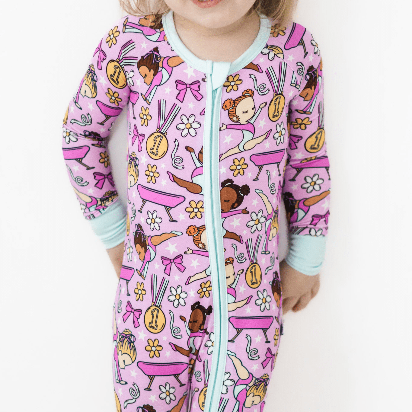 Baby romper with fold-over footed bottoms and a two-way zipper in a Golden Girls print.