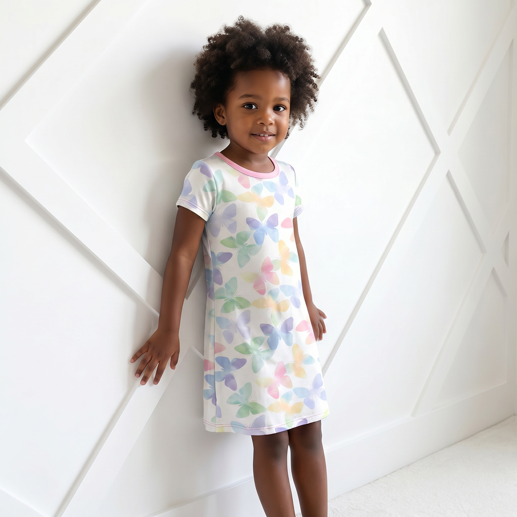 Short sleeve A-line toddler dress in soft bamboo fabric with a wings print and full twirl skirt