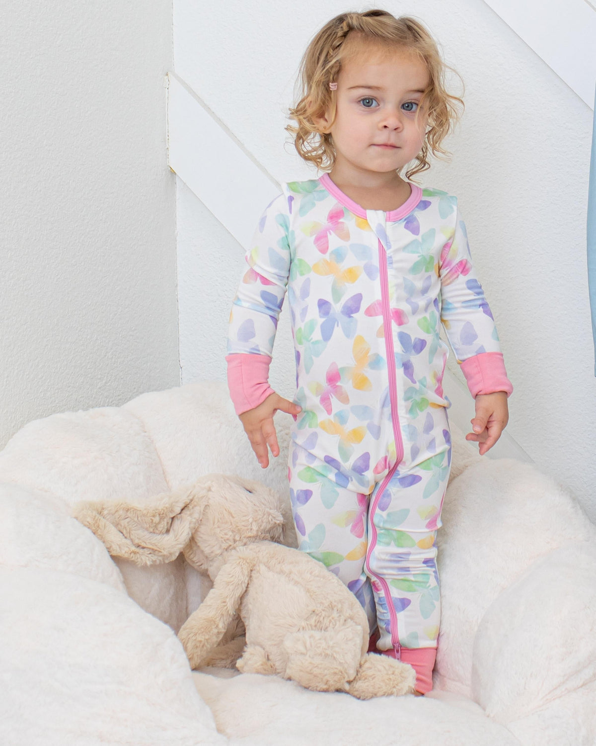 Baby convertible coverall in Grace Wings print with two-way zipper and fold-over convertible feet