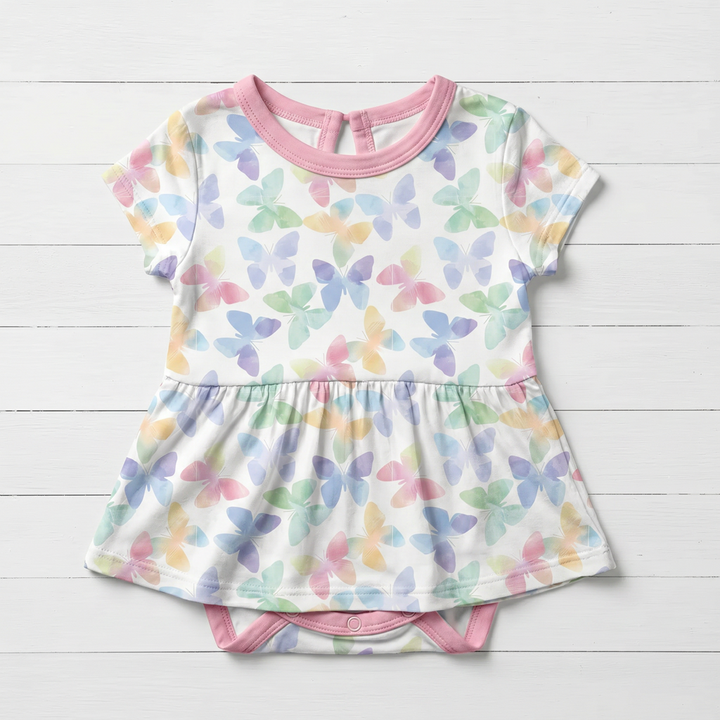 Short sleeve baby bodysuit dress in Grace Wings print with a full skirt and snaps at the bottom