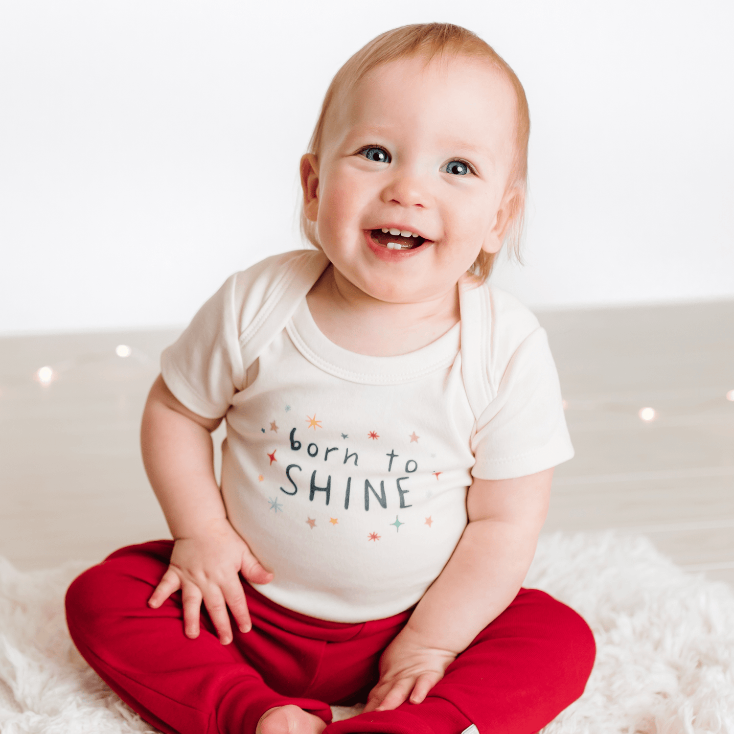 Finn + Emma graphic bodysuit | born to shine - 