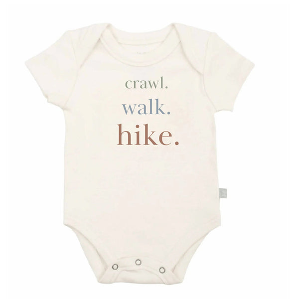 Baby bodysuit printed with the phrase Crawl Walk Hike and snap closures at the bottom