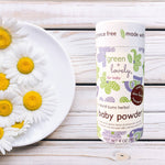 Green + Lovely Herbal Baby Powder with Soothing Oatmeal, shown in a natural, eco-friendly container.