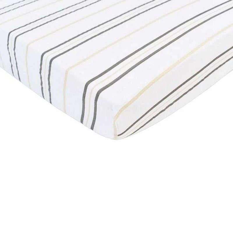 Grey Stripe Crib Sheet on mattress showing breathable, soft fabric.