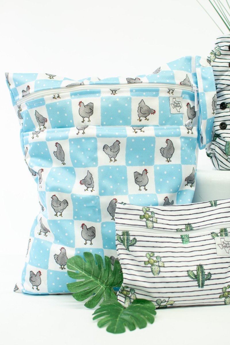 Texas Tushies Guess What Wet Bag with Double Zipper and KAM Snaps for Busy Parents - 