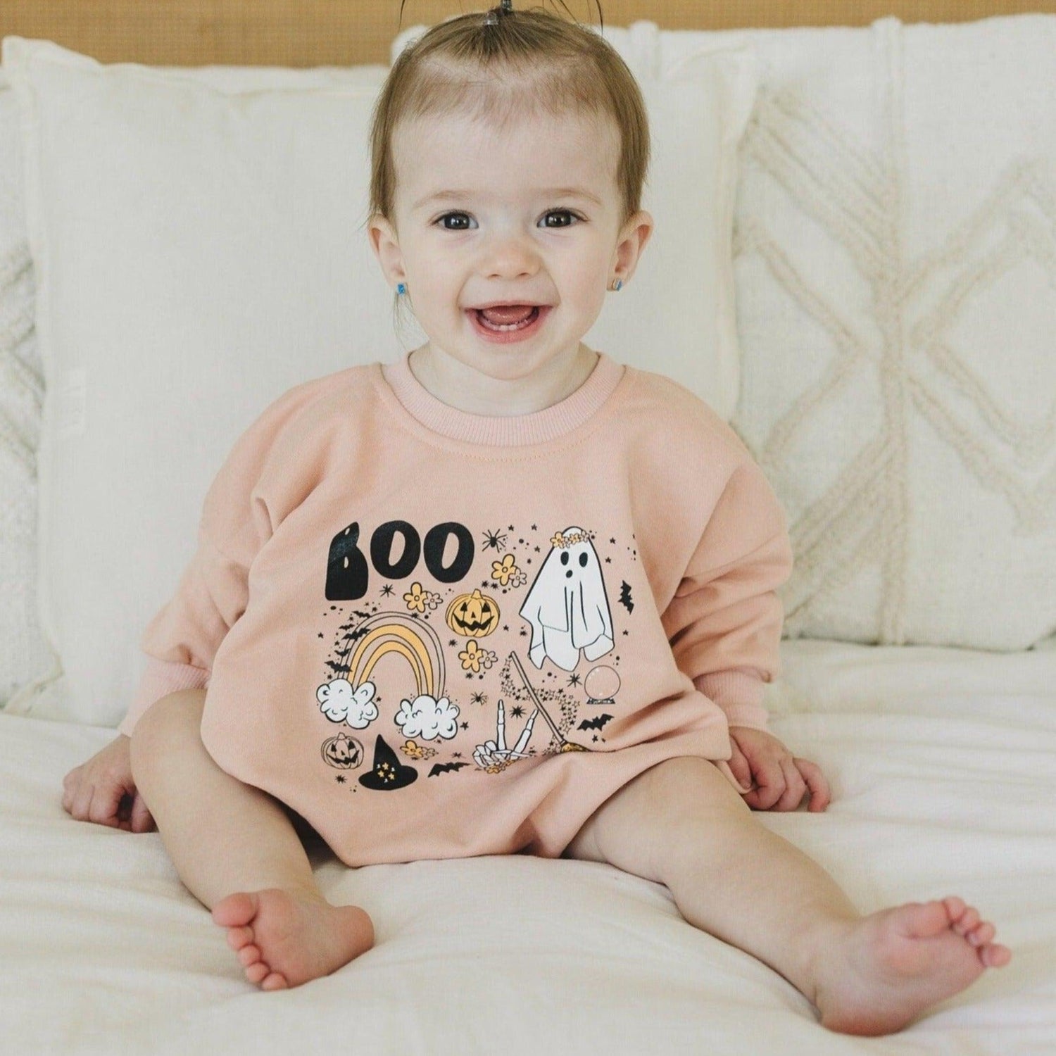 Oversized Halloween-themed graphic sweatshirt romper with snaps at the crotch in lightweight terry.