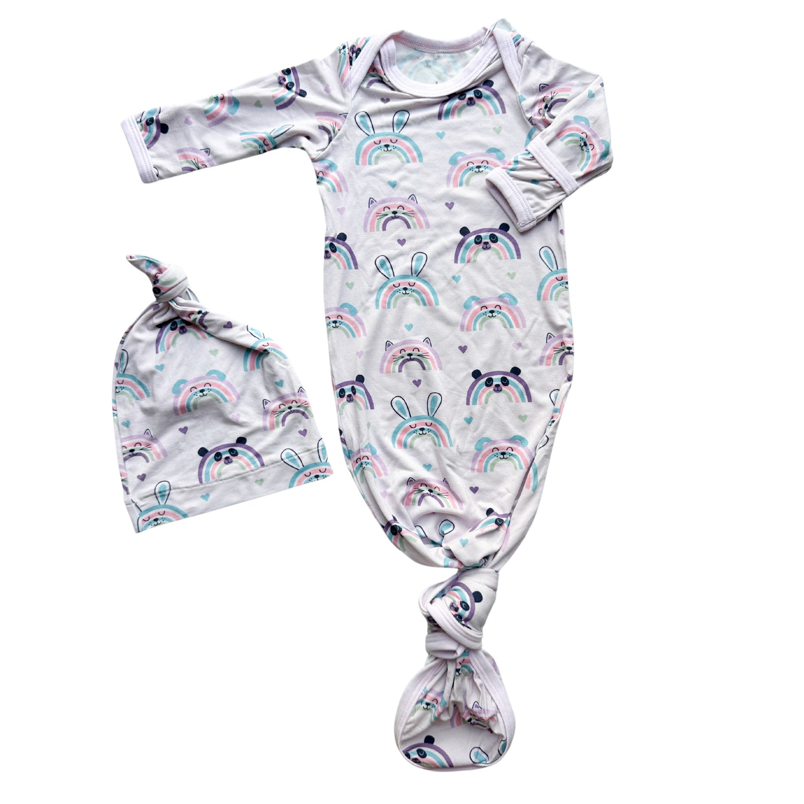 Baby convertible gown with rainbow print and matching hat, featuring fold-over hand mittens