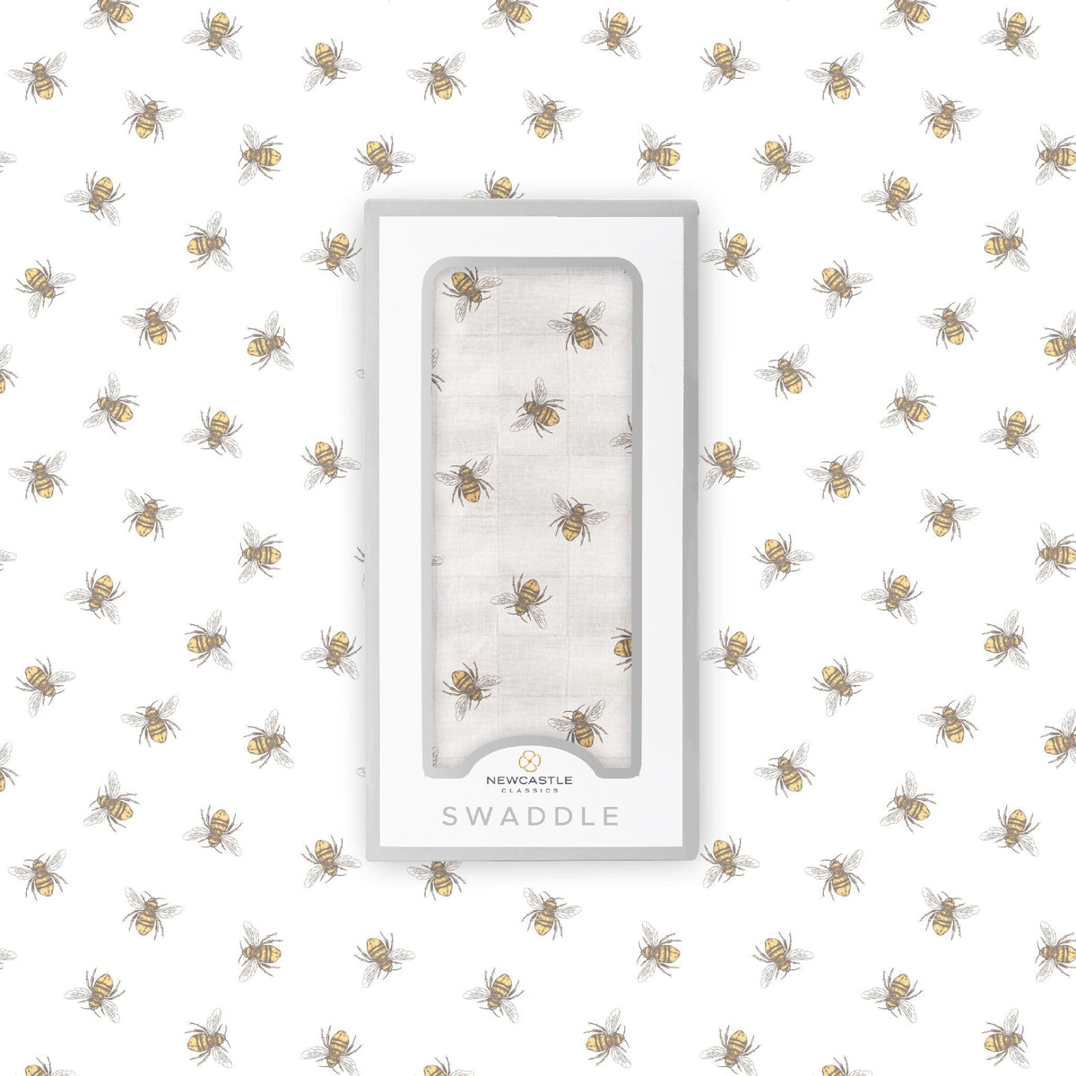 Soft organic bamboo baby swaddle blanket with a charming honey bee print, folded neatly.