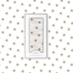Soft organic bamboo baby swaddle blanket with a charming honey bee print, folded neatly.