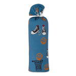 Baby swaddle blanket with a basketball, high top sneaker, and hoop print in a repeating pattern