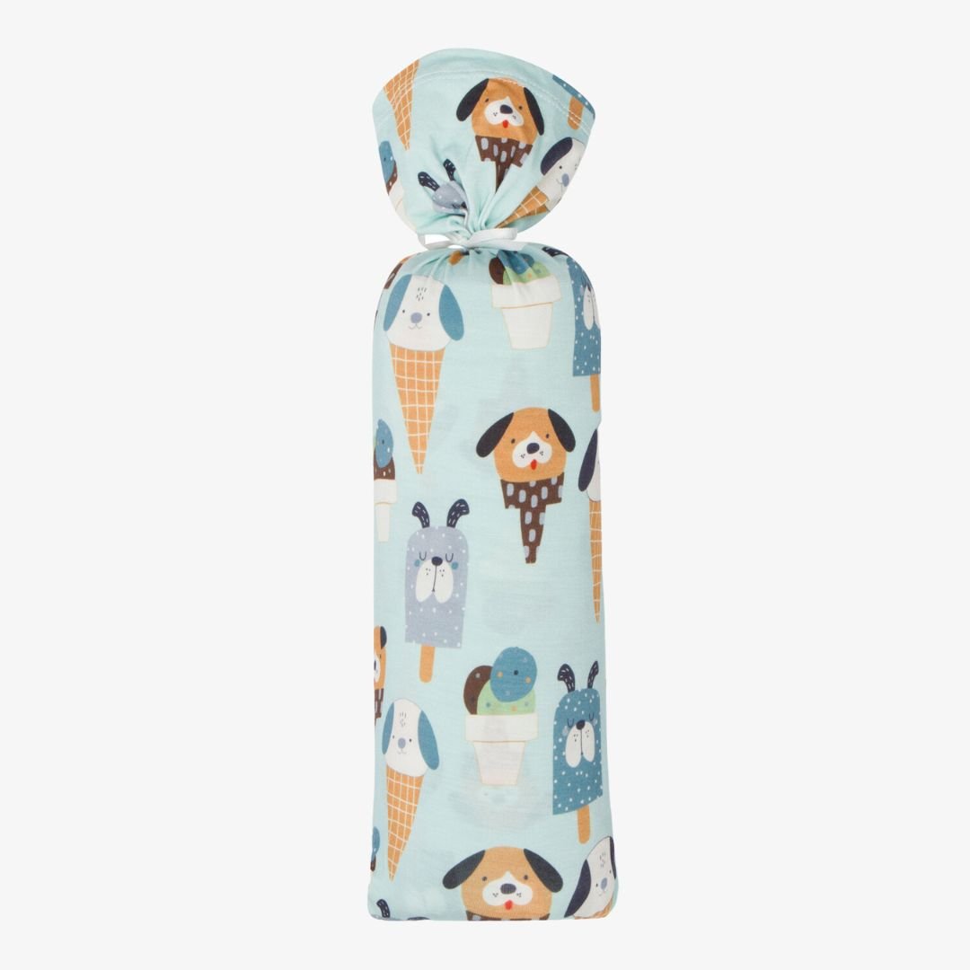 Blue swaddle blanket printed with puppies and ice cream cones on both sides