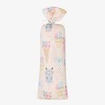 Pink swaddle blanket printed with cats and ice cream cones on both sides.