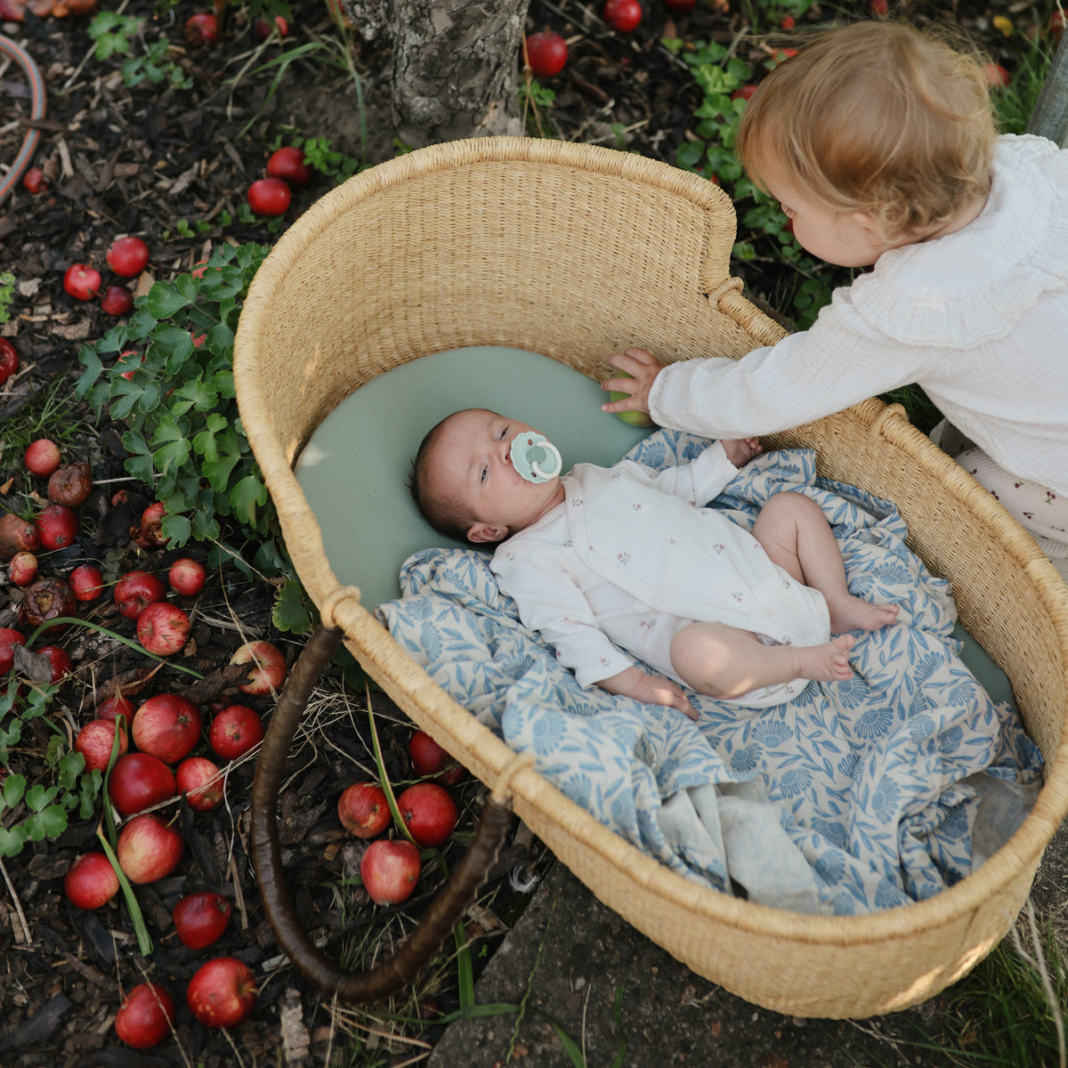 Mushie organic cotton muslin swaddle blanket