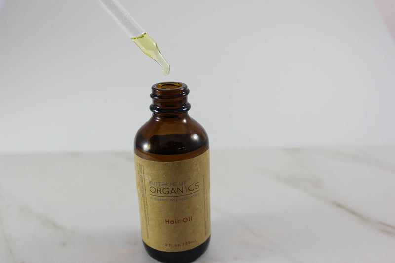 Organic Hair Oil Repair bottle with dropper, for shiny healthy hair.