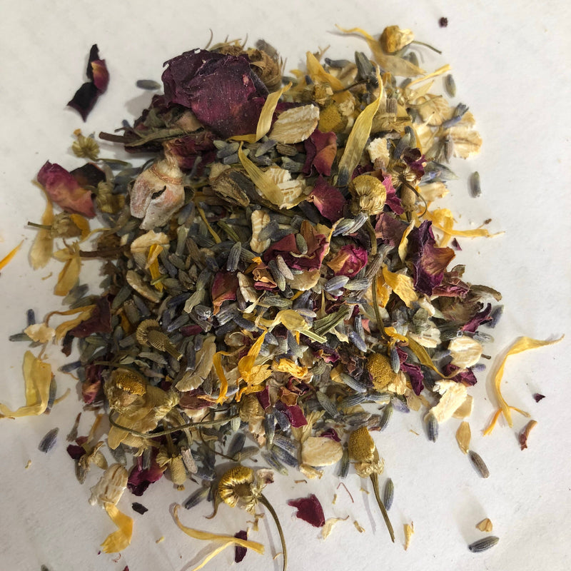 Organic sitz tea blend with calendula, lavender, roses, and oats.