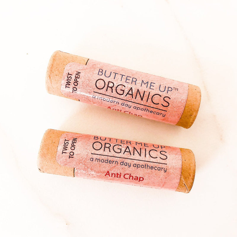 Organic anti-chap lip balm in eco-friendly paperboard tube with natural ingredients.