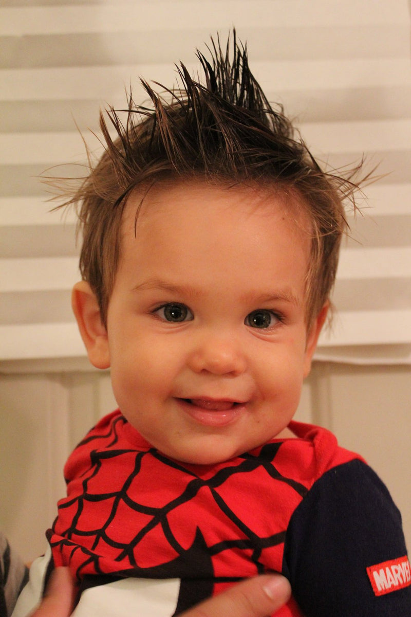 Organic hair wax styled on baby for spiky look.
