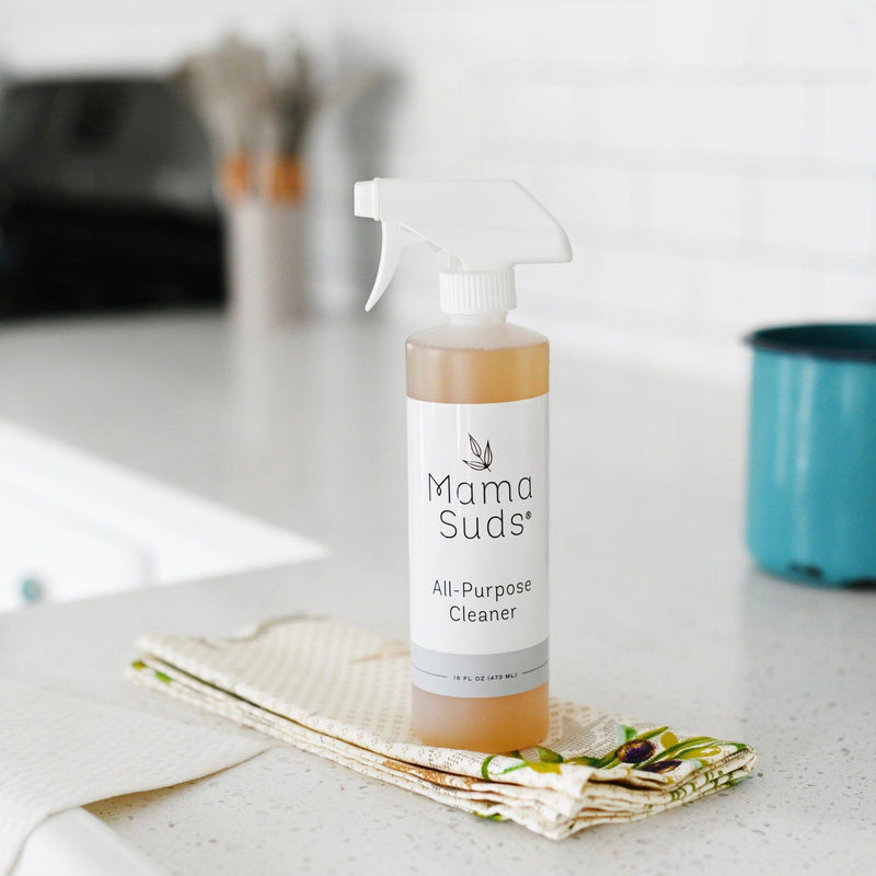 MamaSuds All-Purpose Cleaner Spray on countertop, eco-friendly cleaning solution.