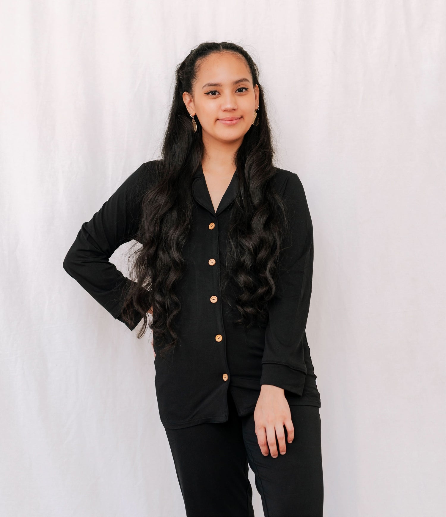 Adult button-up pajama top in dark Nightfall shade with white trim along the collar and placket