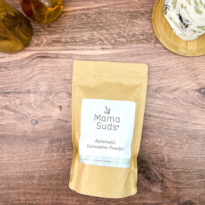 MamaSuds Automatic Dishwasher Powder on wooden surface, eco-friendly packaging.