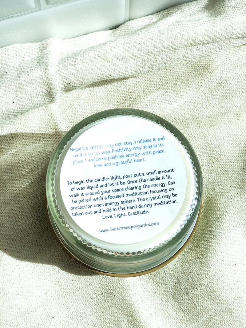 Space Clearing Candle with organic soy wax and crystals for cleansing and intention setting.