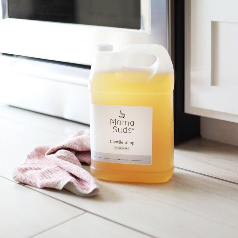 Castile Liquid Soap in BPA-free recyclable bottle by MamaSuds, versatile for cleaning, natural ingredients, lavender or lemon scent options.