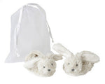 Ivory rabbit-shaped baby slippers presented in a sheer organza gift bag