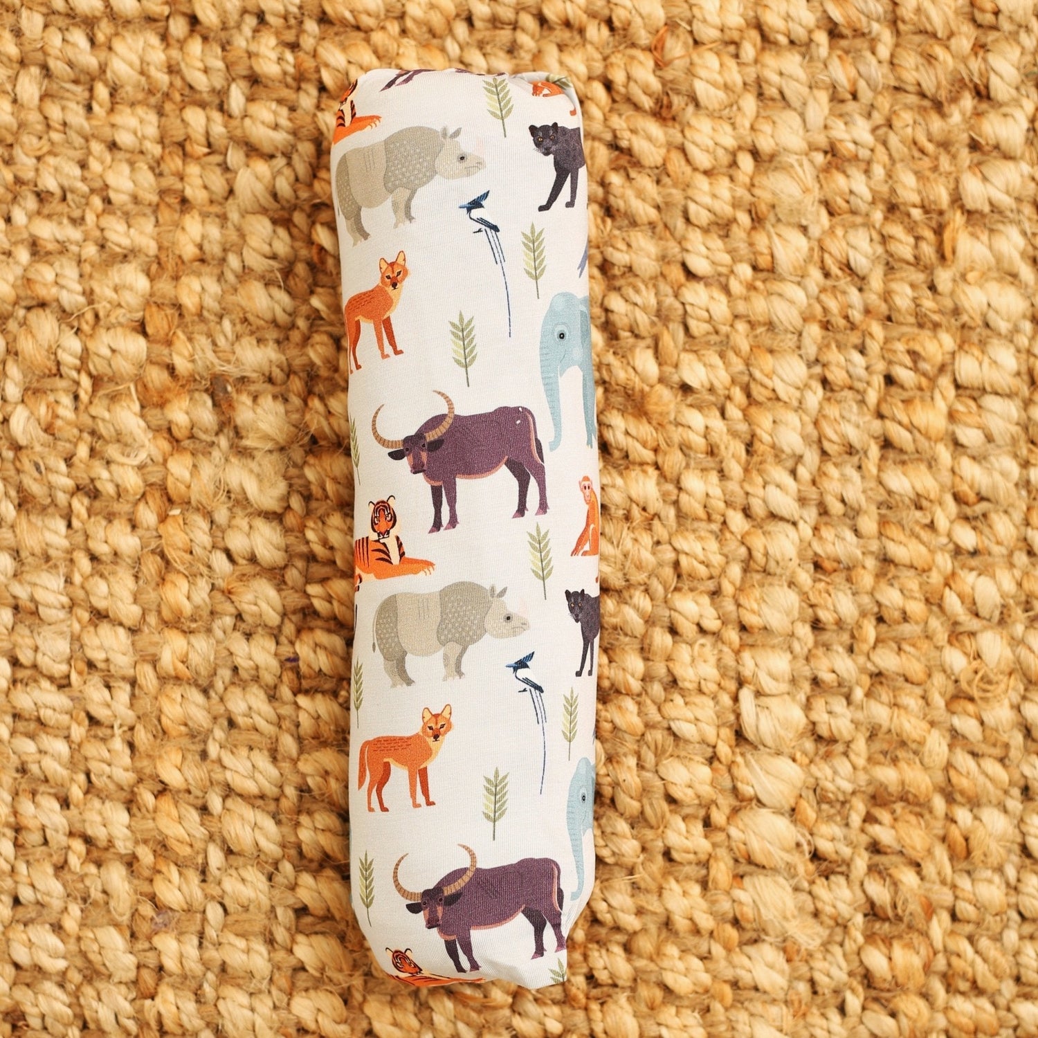 Square baby swaddle blanket with a jungle animal print featuring elephants