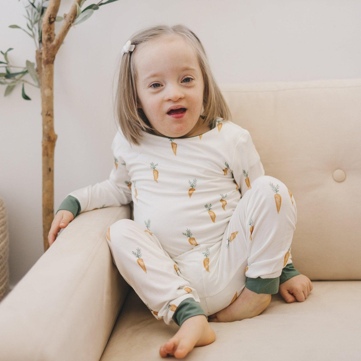 Two-piece bamboo pajama set with long-sleeve top and pants in a carrot print