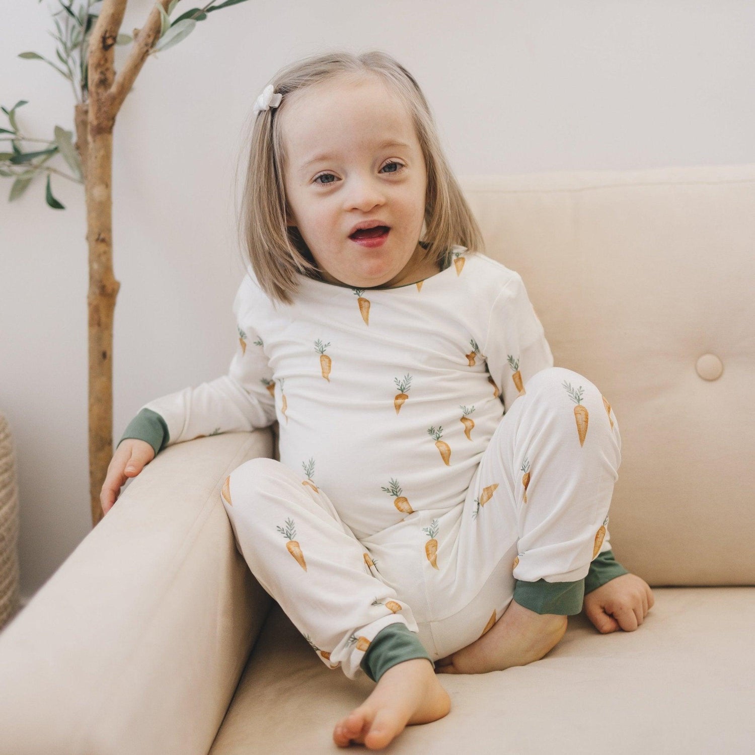 Two-piece bamboo pajama set with long-sleeve top and pants in a carrot print