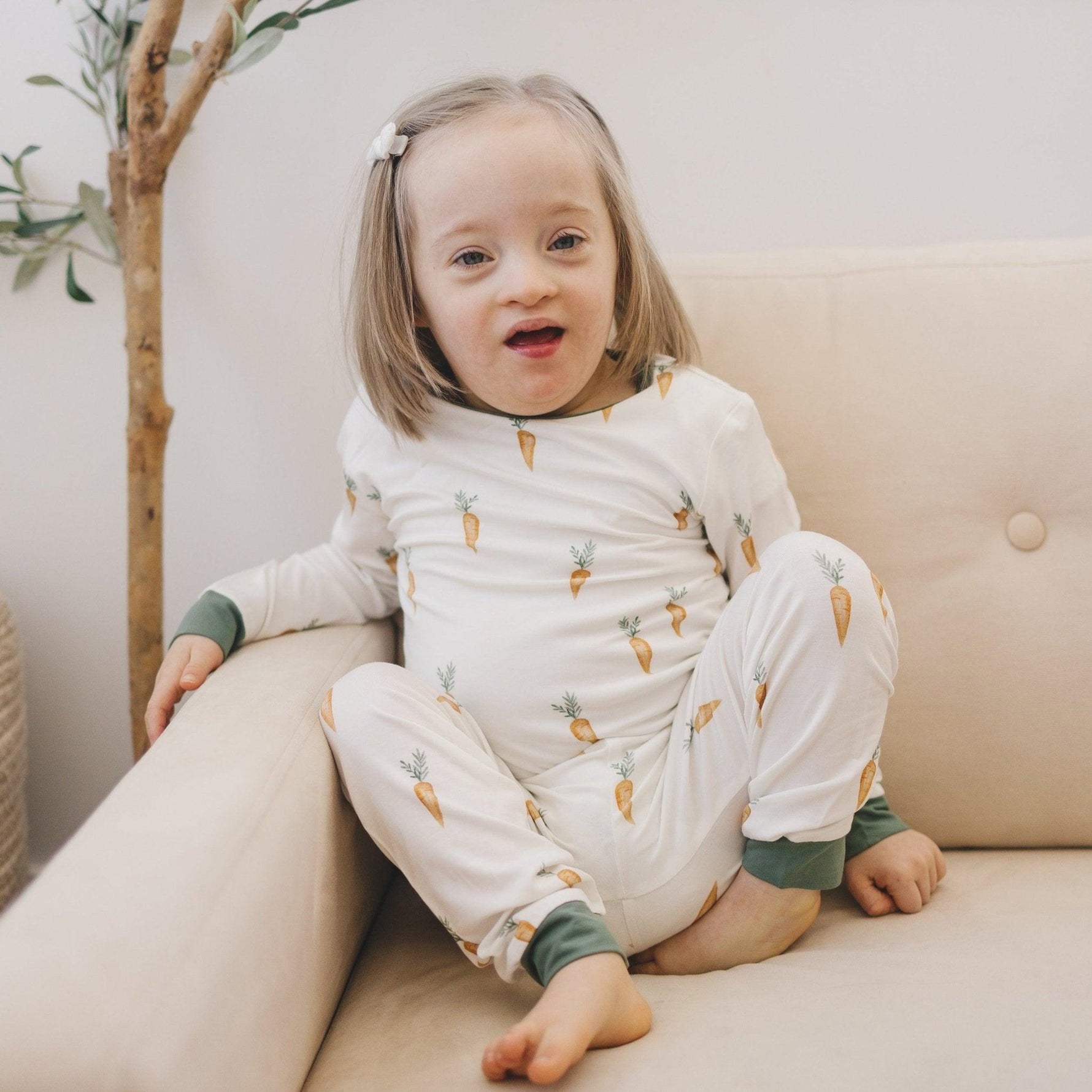 Two-piece bamboo pajama set with long-sleeve top and pants in a carrot print