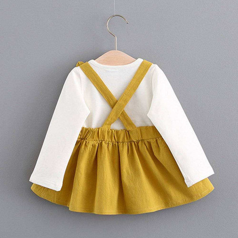 Girl fairy tale dress with yellow mini skirt and suspenders, full sleeves, made of high-quality cotton.